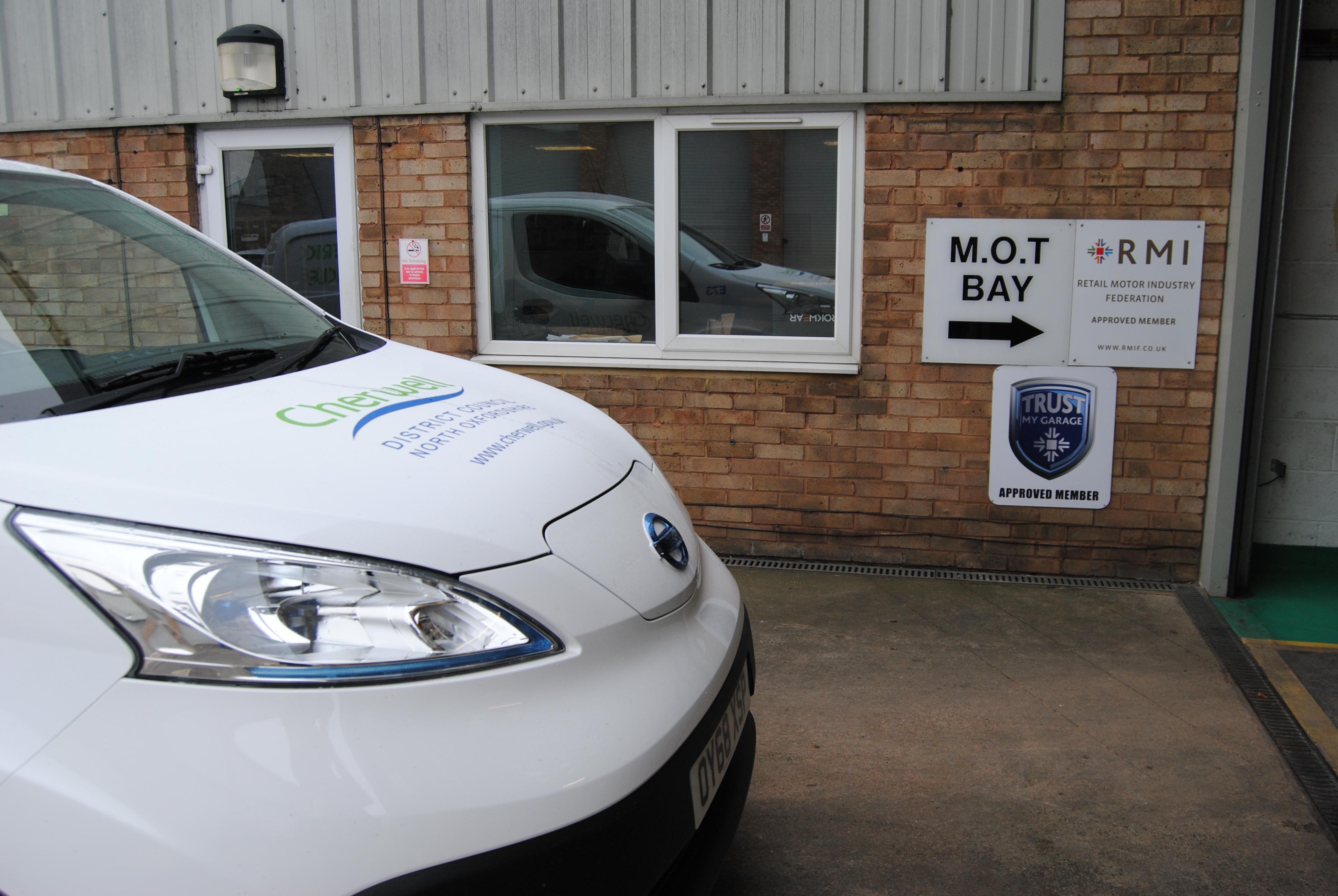 One of our electric vehicles is entering the MOT bay