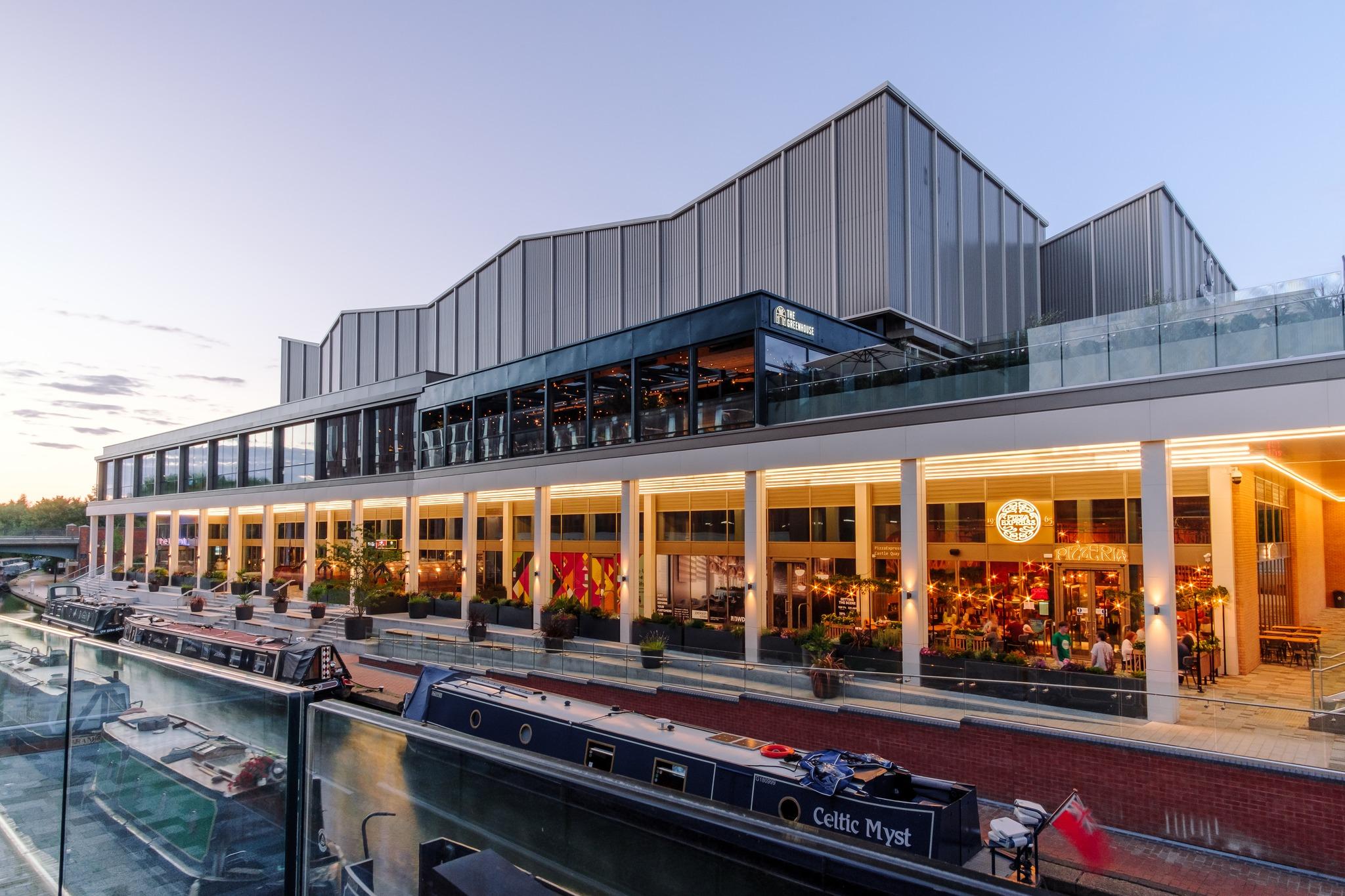 Banbury Waterfront lit up in the evening