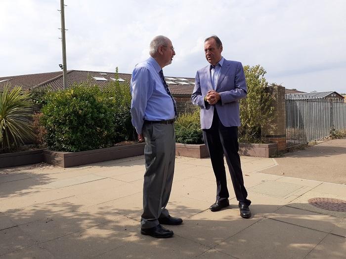 Cllr Wood talking to refugees minister