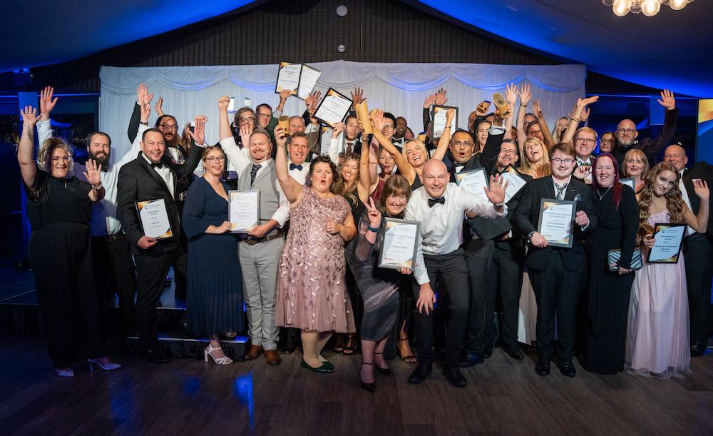 image of award winners celebrating