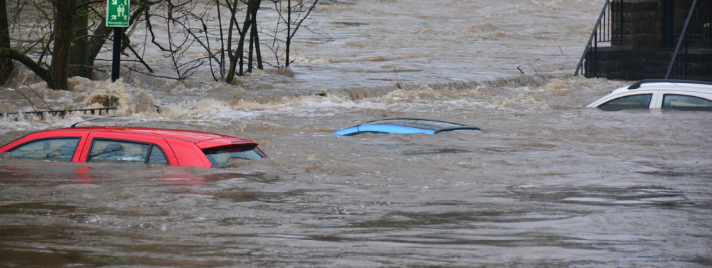 Cars submerged by flood water