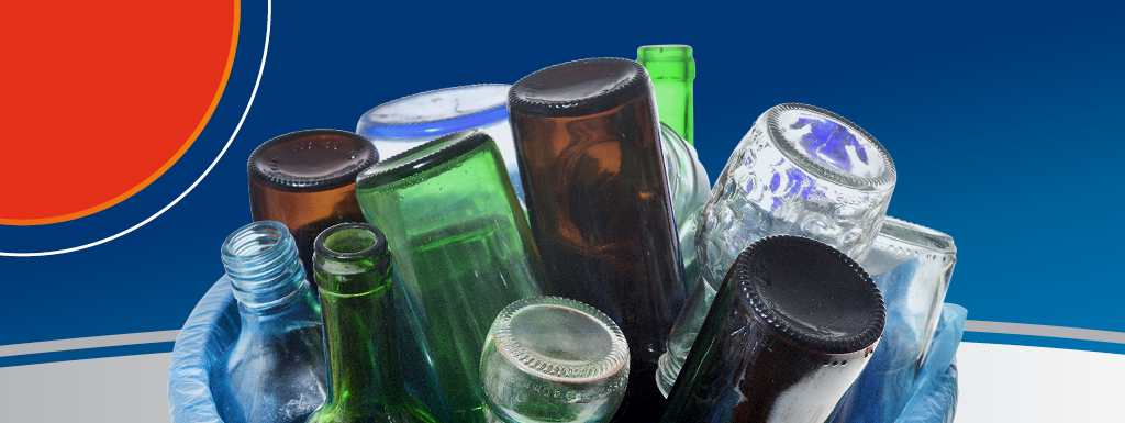 Glass bottles in a container ready for recycling collection