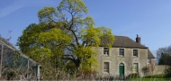 a historic farm building at Stratfield Farm